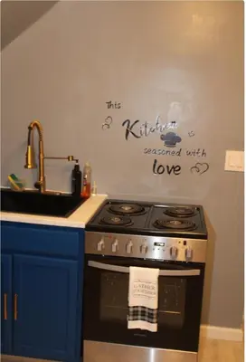 a kitchen with a stove and a sink at Keri APRN LLC in Ansonia