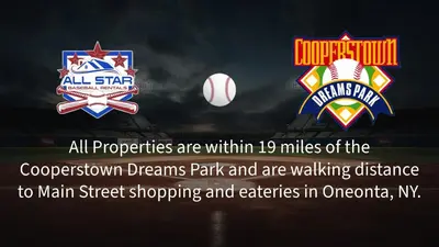 an advertisement for a baseball team with signs and a baseball at Pitcher's Paradise Apt 3 All Star Baseball Rentals in Oneonta