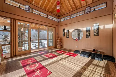 an empty room with red mats on the floor at Catskills Mountain Retreat - Luxury Meets Serenity in Jewett