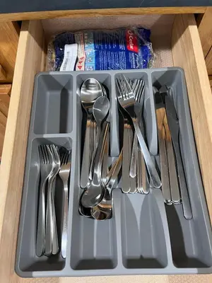 a tray of silver utensils in a drawer at 3BR Private Apt near LGA, JFK, Manhattan, Northern Blvd in Jackson Heights