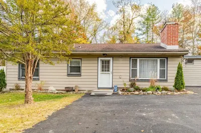 a house with a driveway in front of it at The Meyer spacious family home with hot tub in New Paltz