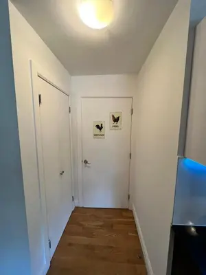 an empty room with a hallway with a door at 4 PEEPS Apt INWILLIAMSBURG in Brooklyn