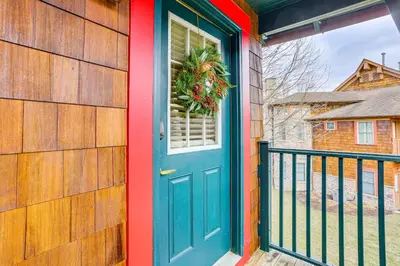 a blue door with a wreath on a balcony at Less Than 1 Mi to Mountain Creek Resort Condo with Balcony in Vernon Township