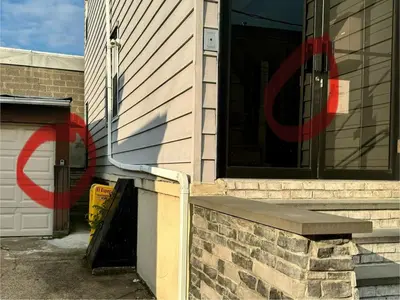 a building with a bench on the side of it at Cozy 1 BR, walk to subway, Free WiFi & Parking in Belleville