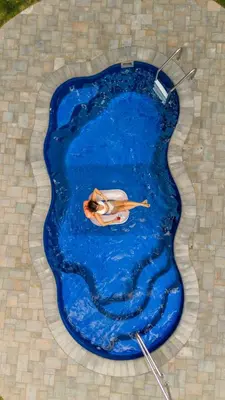 a painting of a woman swimming in a pool at Sauger home in Saugerties