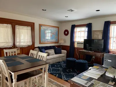 a living room with a couch and a table at White hollow farm in Salisbury