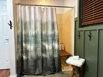 a shower with a shower curtain in a bathroom at EVPg in Lehigh