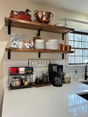 a kitchen counter with plates and cups on shelves at EVPg in Lehigh