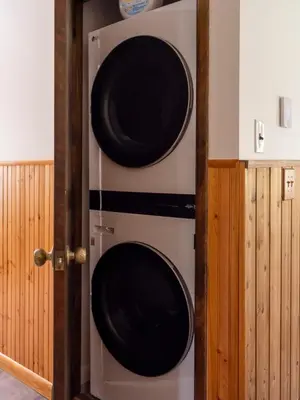 two microwave ovens on the wall of a kitchen at Hunter Mountain View Cabin in Lanesville
