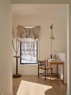 a room with a window with a table and a chair at Modern Mountain Retreat with Hot Tub in Fleischmanns