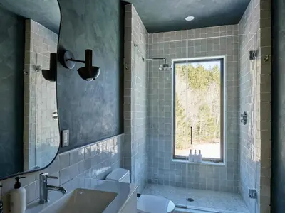 a bathroom with a sink and a window at Modern Mountain Retreat with Hot Tub in Fleischmanns