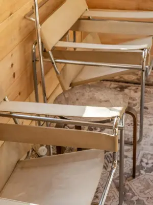 a couple of chairs sitting on top of a room at Modern Rustic Tiny Home in the Catskills in Roscoe