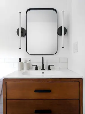 a bathroom with a sink and a mirror at Private Cabin by River with Fireplace in Phoenicia