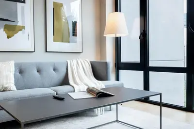 a living room with a couch and a table at 149BK-301 New Construction 1BR Prime BK WD in Brooklyn