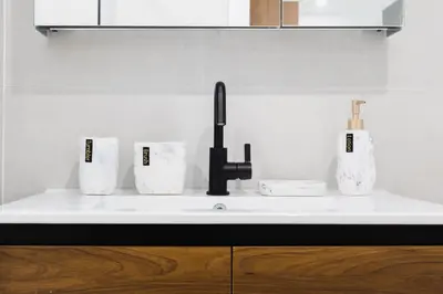 a kitchen counter with a sink with three paper towels at 149BK-302 New Construction 1BR WD in unit Balcony in Brooklyn