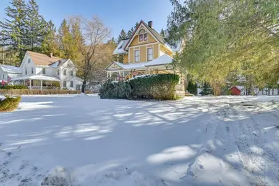 a house with snow on the driveway at 5 Mi to Belleayre Lake Getaway in Fleischmanns! in Fleischmanns