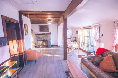 a living room with a couch and a fireplace at Rustic Retreat Fireplace, Casino, Camelback Close to everything! in Mount Pocono