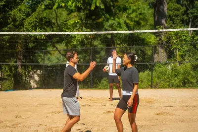 a group of people playing a game of volleyball at Windrose on Hudson in Ossining