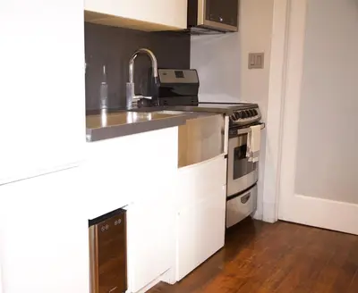 a kitchen with a sink and a stove at New2 York Style Stay near Central Park in New York