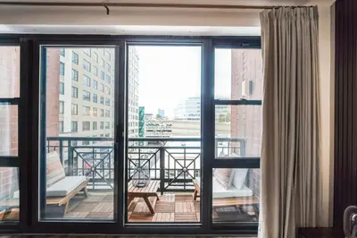 a balcony with a view of a building at The Gallery in Downtown Stamford in Stamford