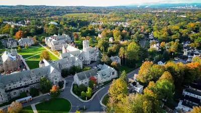 an aerial view of a town with trees and buildings at Spacious Home with Yard and Patio, 2 Mi to Dtwn Troy in Troy