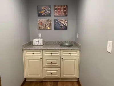 a counter in a room with a counter top at STUNNING RENOVATED 4BR House in Southington