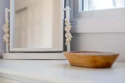 a bowl sitting on a counter next to a door at Renovated Cape Near Beach with Fire Pit in Fairfield