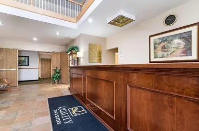 a court room with a large wooden bench at Quality Inn & Suites Schoharie near Howe Caverns in Schoharie