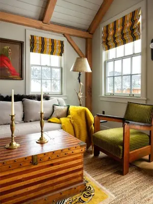 a living room with a couch and a coffee table at Post & Beam - Stunningly Designed Luxury Home with Pool & Hot Tub in Pine Plains