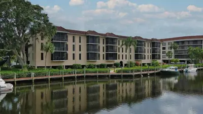 a large building next to a body of water at MA25188C-103 in New York