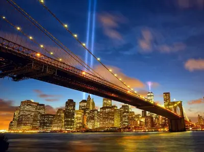 a view of the brooklyn bridge at night at The Tillary Hotel Brooklyn in Brooklyn