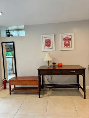 a desk and a bench in a room at Fresh Meadow Studio in Utopia