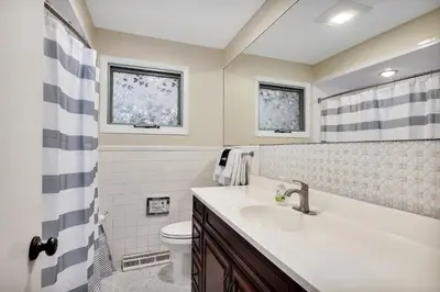 a bathroom with a sink and a toilet at Vacation Home in Albany in Albany