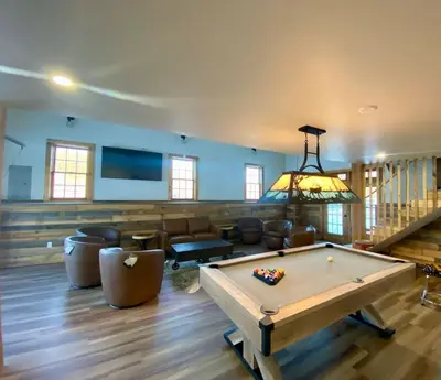 a living room with a pool table in it at Luxury 2 Bedroom Lodge Unit 302 in Wilmington