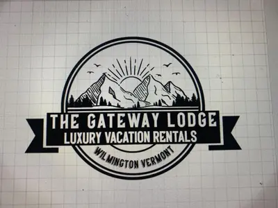 a logo for the gateway lodge luxury vacation rentals at Luxury Townhome 105 in Wilmington