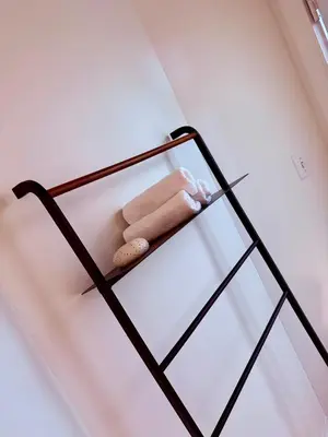 a shelf in a room with a toy on it at le plateau suite in Queens