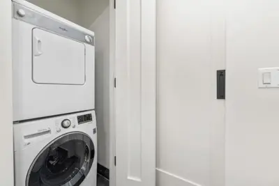 a white washer and dryer in a white room at 3BR Penthouse with Massive Private Rooftop in New York