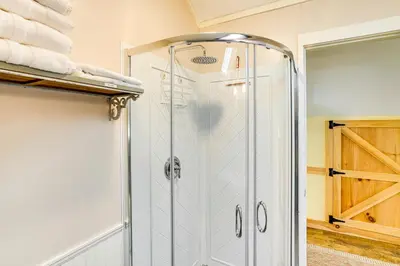 a shower with a glass door in a bathroom at 3 Mi to Hiking Cozy Mt Tremper Apt in Mount Pleasant