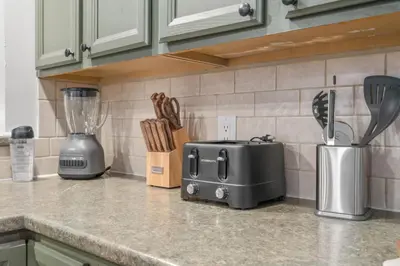a kitchen counter with a toaster and a blender at 31 - Downtown Terryville- 1 Br in Plymouth