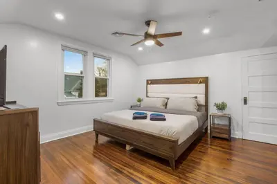 a bedroom with a bed and a ceiling fan at 31 - Downtown Terryville- 1 Br in Plymouth