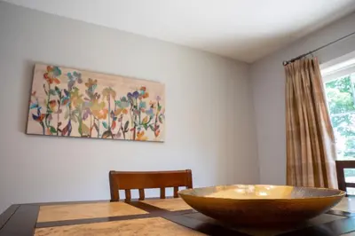 a dining room with a large bowl on a table at 11 - 4 Bedrooms 3 Baths Sleeps up to 10 in Plainville