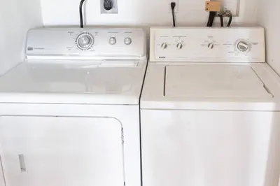 two white appliances in a kitchen next to each other at 2 Beautiful 1 BR Apartment - Central CT in Plainville