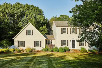 a large white house with a large yard at Beautifully Designed 4BR Home Heated Pool HotTub in Valatie