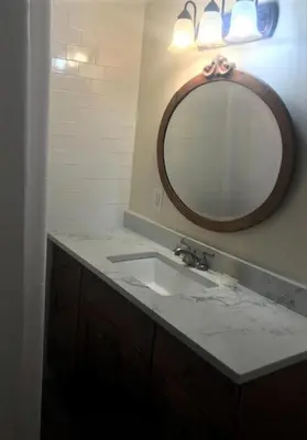 a bathroom with a sink and a mirror at Charming Hudson Valley 3-Bedroom Family Getaway in Tomkins Cove