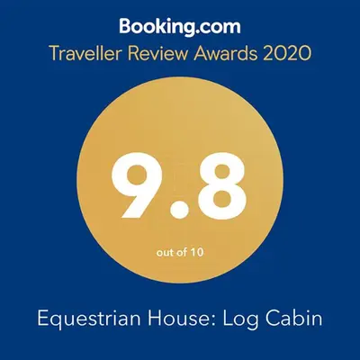 a yellow circle with the words eyelash technician house log cabin at Farm Stay Close to Ski Adventures in Pleasant Mount
