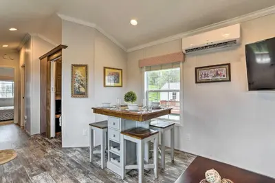 a home bar with stools in a room at Vacation Cottage Getaway Close to Ski Resorts in Pleasant Mount