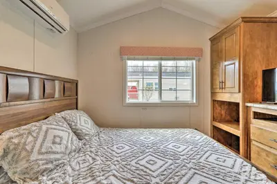 a bedroom with a bed and a window at 12 Bedroom Estate Experience 100 Acre Near Ski Area in Pleasant Mount