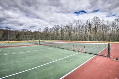 two tennis nets on a tennis court at Home Away from the City Close to Ski Trails in Pleasant Mount