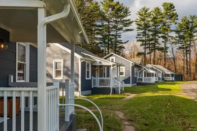a row of houses in a row at Perch Cottages #9 - Creek Access, Sauna, Mt views in Boiceville