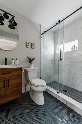 a white bathroom with a toilet and a shower at Perch Cottages #11 - Creek Access, Sauna, Mt views in Boiceville
